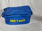 a blue bag with a yellow metro logo on it