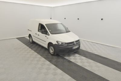 a picture of a white van parked in a garage