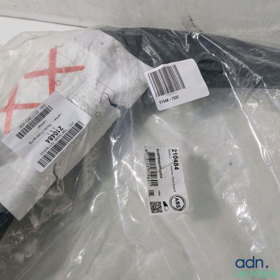 a plastic bag with a red cross on it sitting on a table