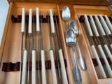 many spoons and spoon spoons in a drawer