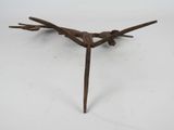 an image of a wooden sculpture of a bird on a branch