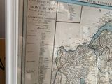 a picture of a map on a wall in a room