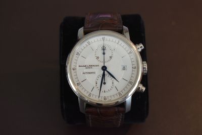 a watch that is sitting on top of a table