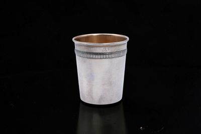 a cup that is sitting on a black table