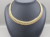 a gold chain necklace on a mannequin mannequin mannequin mannequin mannequin mannequin mannequin mannequin manne