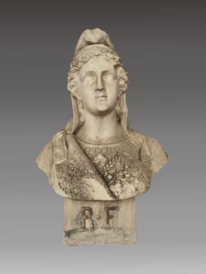 a white marble bust of a woman with a crown on her head