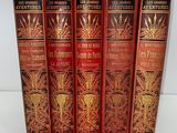 a set of five books sitting on top of each other