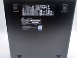 the back of a laptop with a black back panel and a white back panel