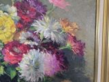 a painting of flowers in a vase on a table