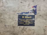 a sticker on the wall of a building that has a sign on it