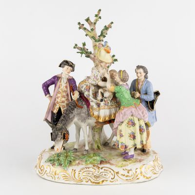 une image représentant une figurine représentant un groupe de personnes à cheval