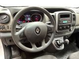 the interior of a car with a steering wheel and dashboard controls
