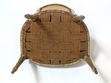 a chair made out of a piece of wood with birds on it