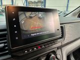 a picture of a car dashboard with a camera mounted on it