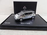 the silver car is in a black box on a white surface