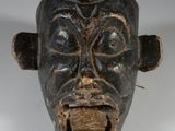 une image représentant une tête d'homme sculptée