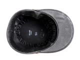 a black hat that is on top of a table