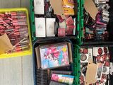 many boxes of school supplies on the floor