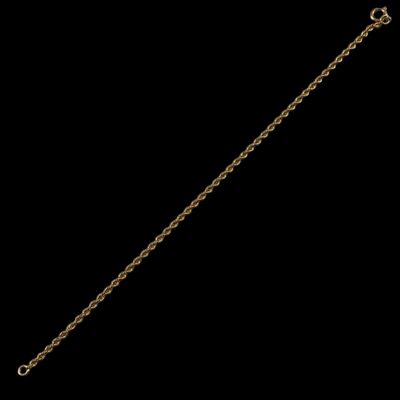 a close up of a gold chain with a heart on it