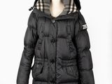 the jacket is black and has a hood on it