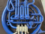 a blue horn that is sitting on a table