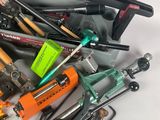 many different types of tools that are sitting on a table