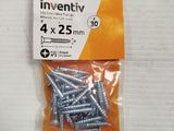 a close up of a package of screws on a table