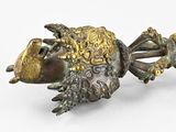 bronze figurine of a bird with a crown on its head