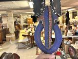 a person holding a pair of scissors in their hand