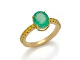 an emerald and diamond ring