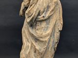 a statue of a woman holding a child in her arms