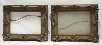pair of antique gold picture frames with glass inserts