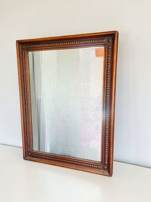 Miroir de forme rectangulaire en bois naturel sculpté à décor d'une fr - Photo 1