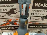 boxes of workin screwdrivers are stacked on top of each other