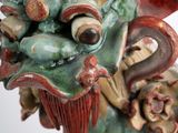 a statue of a dragon that is on display