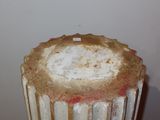 a cake sitting on top of a cake stand on a table