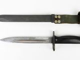 two different types of knives on a white surface