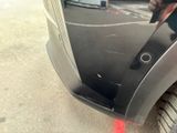 a close up of a car with a red laser on it