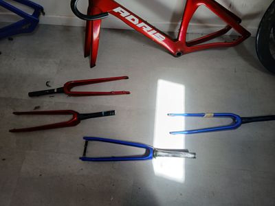 many tools that are sitting on the floor in the garage
