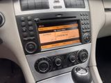 a car dashboard with a radio in the center of it