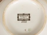 a close up of a plate with a label on it