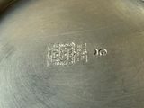 a metal pan that has a metal lid on it