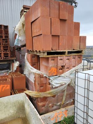 many bricks stacked on top of each other in a pile