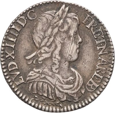 une pièce d'argent représentant une femme