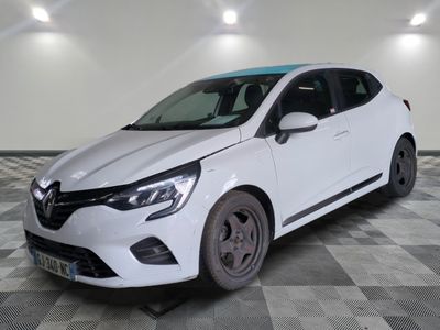 the white car is parked on a checkered floor in the garage