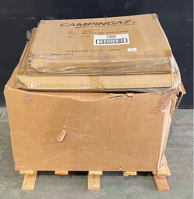 a cardboard box sitting on top of a pallet