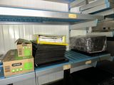 many boxes of food on the shelves in the kitchen