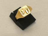an image of a gold signet ring with a horse on it