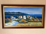 a picture of a painting hanging on the wall above a bed
