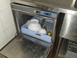 an image of a kitchen with a sink and a dishwasher